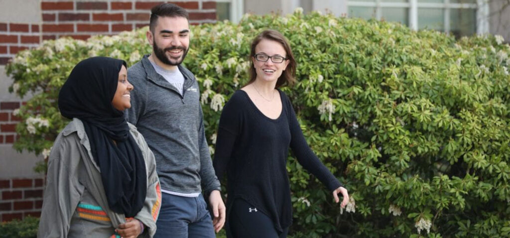 three students walking